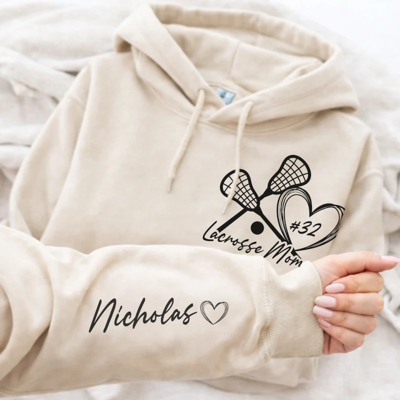 Lacrosse mom hoodie with a name on the sleeve